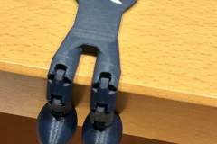 Jeton de caddie personnalisé avec pieds articulés - NuRRe3D Amiens